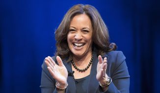 In this Jan. 9, 2019, photo, Sen. Kamala Harris, D-Calif., greets the audience at George Washington University in Washington, during an event kicking off her book tour. Harris, a first-term senator and former California attorney general known for her rigorous questioning of President Donald Trump’s nominees, entered the Democratic presidential race on Monday.  (AP Photo/Sait Serkan Gurbuz)