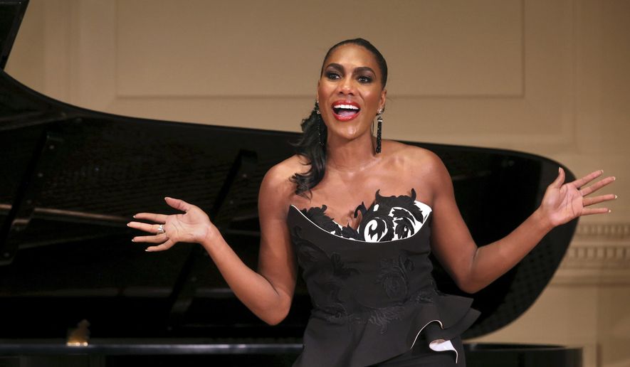 In this Dec. 13, 2018, photo provided by Carnegie Hall, J&#39;nai Bridges, a mezzo-soprano, performs in her recital at Weill Recital Hall in Carnegie Hall in New York. (Carnegie Hall via AP)