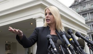 FILE - In this Feb. 22, 2018 file photo, after a meeting on student safety with President Donald Trump at the White House, Florida Attorney General Pam Bondi speaks to reporters outside the West Wing about about responses to school shootings like the attack in Parkland, Fla., in Washington. Bondi is heading to Washington D.C. to take a new post with a leading lobbying firm. Ballard Partners announced Tuesday, Jan. 22, 2019,  the well-known Republican politician will head the firm’s new regulatory compliance office. The firm is headed by Brian Ballard, who has close ties to Trump. The news was first reported by Politico. (AP Photo/J. Scott Applewhite, File)