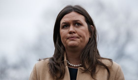 White House press secretary Sarah Huckabee Sanders talks with reporters outside the White House, Wednesday, Jan. 9, 2019, in Washington. (AP Photo/ Evan Vucci) ** FILE **