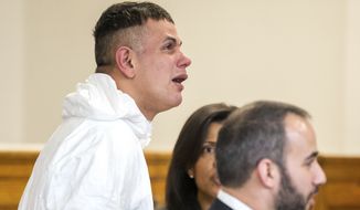 Victor Pena, left, is arraigned on kidnapping charges at the Charlestown Division of the Boston Municipal Court in Charlestown, Mass., Wednesday, Jan. 23, 2019. Pena, who has been charged with kidnapping a 23-year-old woman in Boston has been ordered to undergo a mental health evaluation and will be held without bail. (Aram Boghosian/The Boston Globe via AP, Pool)