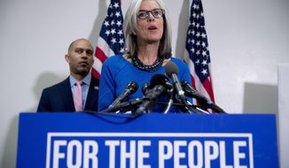 Democratic Caucus Vice Chair Katherine Clark, D-Mass., accompanied by Democratic Caucus Chairman Rep. Hakeem Jeffries of N.Y., left, speaks at a news conference following a House Democratic Caucus meeting on Capitol Hill in Washington, Wednesday, Jan. 23, 2019. (AP Photo/Andrew Harnik)