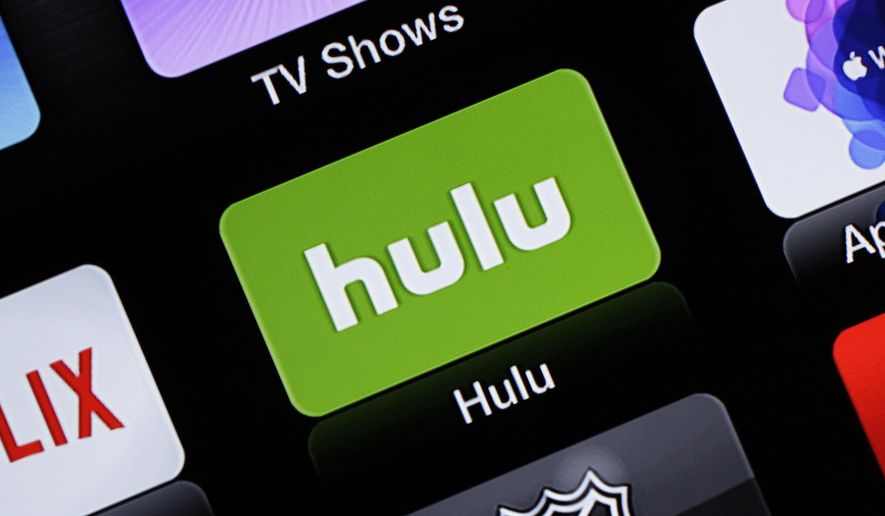 FILE- This June 24, 2015, file photo shows the Hulu Apple TV app icon in South Orange, N.J. Hulu&#39;s live-TV streaming service will cost $5 more per month, while its traditional video-on-demand service will be $2 cheaper. Hulu with Live TV, a cable-like package with ESPN and a few dozen other channels, will cost $45 a month starting Feb. 26, 2019. (AP Photo/Dan Goodman, File)