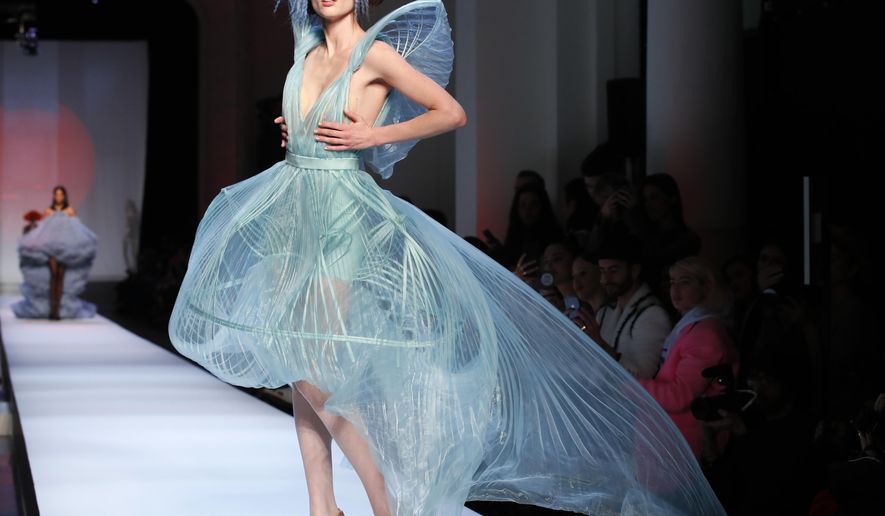 A model wears a creation for Jean-Paul Gaultier&#x27;s Spring/Summer 2019 Haute Couture fashion collection presented in Paris, Wednesday Jan.23, 2019. (AP Photo/Francois Mori)