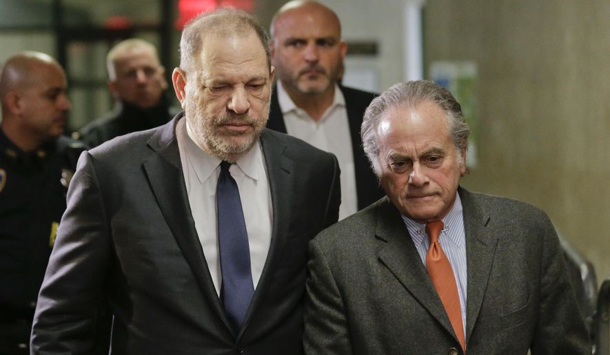 FILE- In this Dec. 20, 2018 file photo, Harvey Weinstein, left, arrives at New York Supreme Court with his attorney Benjamin Brafman in New York. Brafman filed court papers on Thursday, Jan. 17, 2019, asking to withdraw as Weinstein&#39;s lawyer. The high-profile criminal defense lawyer is leaving the movie producer&#39;s rape case weeks after failing to get the charges dismissed. (AP Photo/Seth Wenig, File)