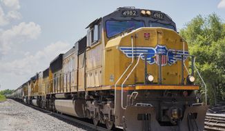 In this July 31, 2018, photo, a Union Pacific train travels through Union, Neb. (AP Photo/Nati Harnik) **FILE**