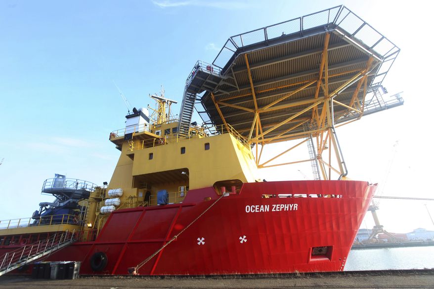 The Ocean Zephyr stands docked in Bremerhaven, Germany, Wednesday Jan. 23, 2019. The Britain-based Nekton Mission will use submarines to go 300 meters below the surface and sonar equipment to survey depths of up to 2,000 meters once the Ocean Zephyr reaches the Seychelles. Final preparations were being made Thursday for the start of an unprecedented, years-long mission to explore the Indian Ocean, during which scientists hope to document changes taking place beneath the waves that could affect billions of people in the surrounding region over the coming decades. (AP Photo/Stephen Barker)