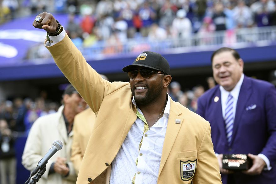FILE - In this Sept. 23, 2018, file photo, former Baltimore Ravens linebacker Ray Lewis displays his Hall of Fame ring of excellence that he received at a halftime ceremony during an NFL football game between the Ravens and the Denver Broncos, in Baltimore. Lewis is using the celebrity spotlight which will accompany Super Bowl 53 to bring exposure to his Ray of Hope Foundation. Lewis is throwing a big-ticket party, expected to attract dozens of sports and entertainment stars, to raise money for the foundation. (AP Photo/Nick Wass, File)