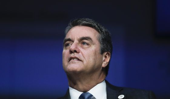 Roberto Azevedo, Director General of the World Trade Organization, WTO, attends a session at annual meeting of the World Economic Forum in Davos, Switzerland, Thursday, Jan. 24, 2019. (AP Photo/Markus Schreiber)