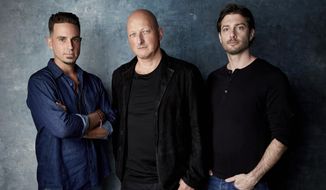 Wade Robson, from left, director Dan Reed and James Safechuck pose for a portrait to promote the film &amp;quot;Leaving Neverland&amp;quot; at the Salesforce Music Lodge during the Sundance Film Festival on Thursday, Jan. 24, 2019, in Park City, Utah. (Photo by Taylor Jewell/Invision/AP)