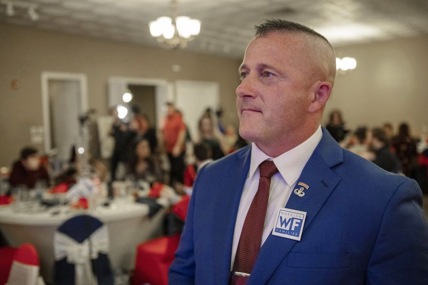 FILE - In this Tuesday, Nov. 6, 2018 file photo, Richard Ojeda, Democratic candidate for West Virginia's 3rd Congressional district, watches election results during his campaign's watch party at Special Occasions in Yuma, W.Va. Ojeda, a tattooed veteran who recently ran for Congress, says he isn't getting the money or attention needed to sustain a campaign for President. (Dylan Vidovich/The Logan Banner via AP, File)