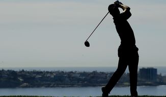 Justin Rose, of England, hits his tee shot on the fourth hole during the second round of the Farmers Insurance Open golf tournament on the South Course at Torrey Pines on Friday, Jan. 25, 2019, in San Diego. (AP Photo/Chris Carlson)