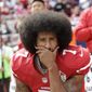 In this Oct. 2, 2016, file photo, then-San Francisco 49ers quarterback Colin Kaepernick kneels during the national anthem before an NFL football game against the Dallas Cowboys, in Santa Clara, Calif. Ex-NFL player Colin Kaepernick helped start a wave of protests by kneeling during the national anthem to raise awareness to police brutality, racial inequality and other social issues. Big-name entertainers believe social injustice needs to be addressed during the Super Bowl and are ensuring the topic that ignited a political firestorm and engulfed the NFL will be in the spotlight. (AP Photo/Marcio Jose Sanchez, File) **FILE**