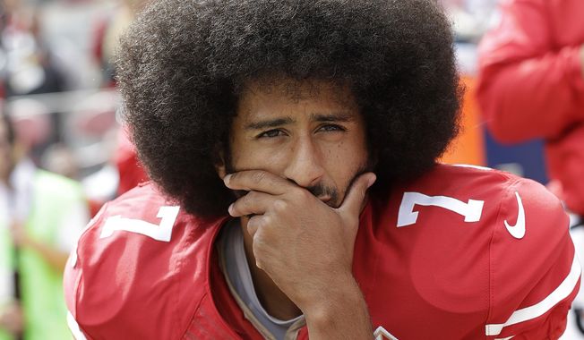In this Oct. 2, 2016, file photo, then-San Francisco 49ers quarterback Colin Kaepernick kneels during the national anthem before an NFL football game against the Dallas Cowboys, in Santa Clara, Calif. Ex-NFL player Colin Kaepernick helped start a wave of protests by kneeling during the national anthem to raise awareness to police brutality, racial inequality and other social issues. Big-name entertainers believe social injustice needs to be addressed during the Super Bowl and are ensuring the topic that ignited a political firestorm and engulfed the NFL will be in the spotlight. (AP Photo/Marcio Jose Sanchez, File) **FILE**