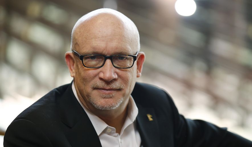 FILE - In this Feb. 17, 2016 file photo, Alex Gibney, director of the fIlm &amp;quot;Zero Days&amp;quot; poses for a photo at the 2016 Berlinale Film Festival in Berlin, Germany. Oscar-winning filmmaker Gibney has premiered his latest documentary on the fraudulent tech startup Theranos at the Sundance Film Festival Thursday night, Jan. 24, 2019. &amp;quot;The Inventor: Out for Blood In Silicon Valley&amp;quot; is among a handful of films that kicked off the annual independent festival. (AP Photo/Axel Schmidt, File)