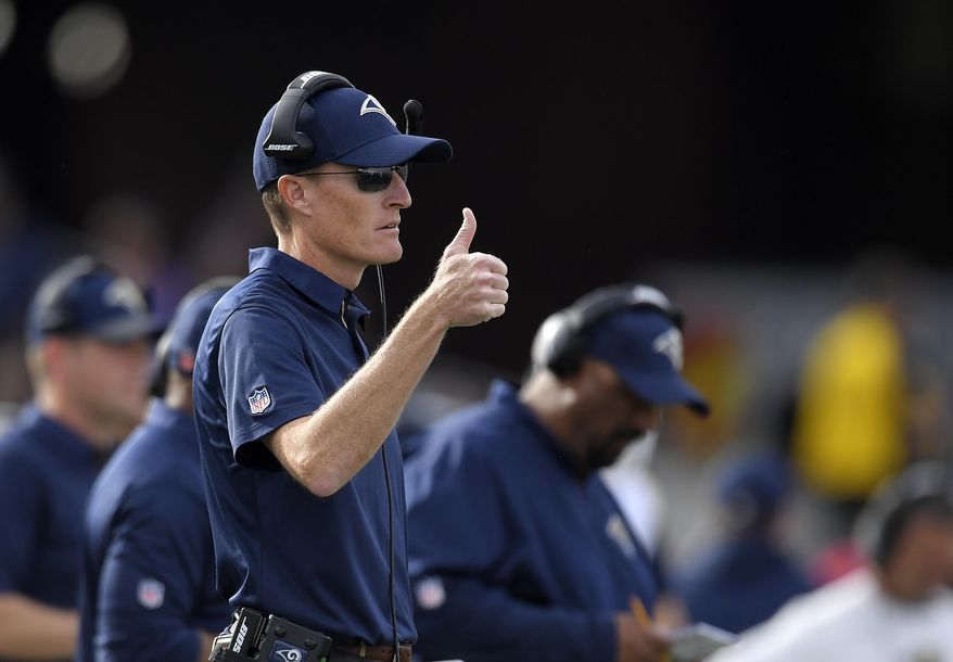 FILE - In this Dec. 10, 2017, file photo, Los Angeles Rams special teams coordinator John Fassel gestures during an NFL football game against the Philadelphia Eagles, in Los Angeles. Fassel's fingerprints were all over the Rams' NFC championship game victory, from the fake punt to the 57-yard winning field goal. Los Angeles' peerless special teams coordinator isn't saying whether he's cooking up something for the Super Bowl, but Fassel's units are a major part of the Rams' success. (AP Photo/Mark J. Terrill, File)