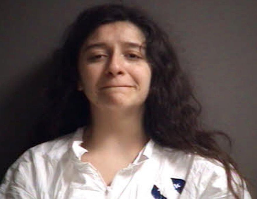 This photo provided by Radford City Police Department shows Luisa Ines Tudela Harris Cutting. Cutting, a Virginia college student is accused of stabbing a fellow student to death. She was arrested and charged Thursday, Jan. 24, 2019 with second-degree murder. She's set to appear in court Friday. (Radford City Police Department via AP)