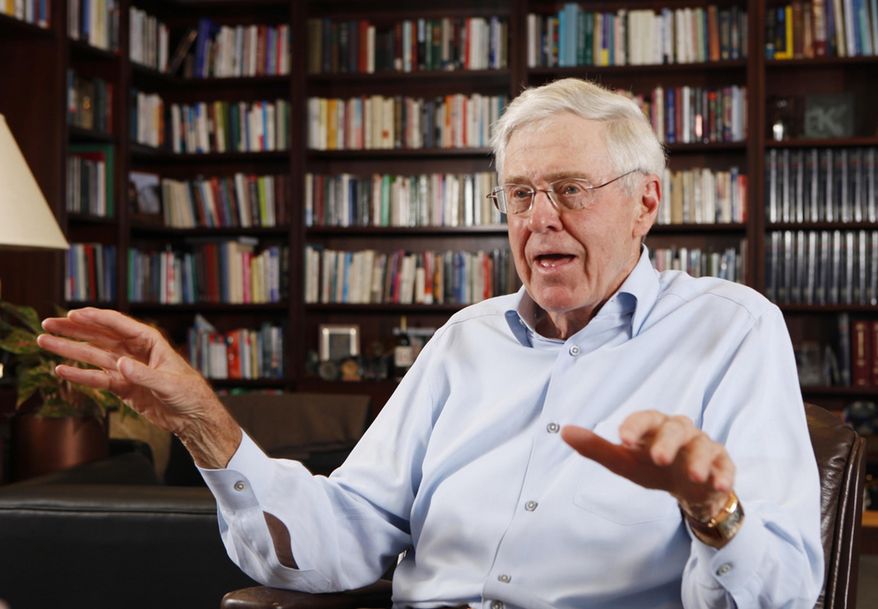 FILE - In this photo May 22, 2012 file photo, Charles Koch speaks in his office at Koch Industries in Wichita, Kan. Hundreds of wealthy donors gathered by billionaire industrialist Charles Koch will be meeting this weekend of Jan. 26, 2019, for the first time since the influential conservative political network announced it won't spend any money on the 2020 presidential race. (Bo Rader/The Wichita Eagle via AP, File)