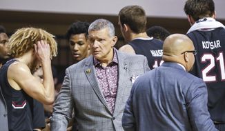 South Carolina coach Frank Martin talks to a player during an NCAA college basketball game against Oklahoma State, Saturday, Jan. 26, 2019, in Stillwater, Okla. (Devin Lawrence Wilber/Tulsa World via AP)