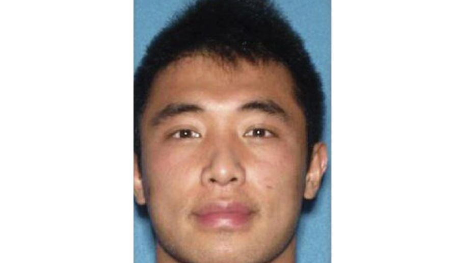 This photo provided by (Monmouth County Prosecutors Office shows Terry Kuo. Monmouth County prosecutors on Friday, Jan. 25, 2019 announced conspiracy, theft, insurance fraud and forgery charges against Kuo. Fifteen other people also face charges. They are charged in an alleged scheme from 2015 to 2017 to steal identities, get credit cards and make $400,000 in purchases without payment. (Monmouth County Prosecutors Office)