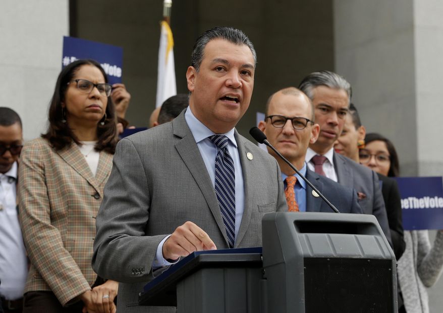Secretary of State Alex Padilla discusses a proposed constitutional amendment to allow parolees to vote as the amendment's author, Assemblyman Kevin McCarty, D-Sacramento, right, looks on during a news conference at the Capitol, Monday Jan. 28, 2019, in Sacramento, Calif. (AP Photo/Rich Pedroncelli)