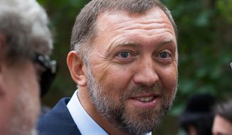 FILE- In this July 2, 2015, file photo, Russian metals magnate Oleg Deripaska attends Independence Day celebrations at Spaso House, the residence of the American Ambassador, in Moscow, Russia. The U.S. Treasury has lifted sanctions on three Russian companies connected to Russian billionaire Oleg Deripaska, it was announced Monday, Jan. 28, 2019 reversing a move which wreaked havoc on global aluminum markets last year. (AP Photo/Alexander Zemlianichenko, File)