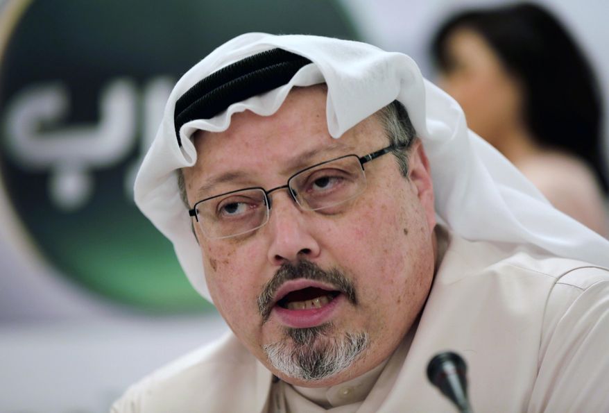 In this Dec. 15, 2014, file photo, Saudi journalist Jamal Khashoggi speaks during a press conference in Manama, Bahrain. Turkish Foreign Minister Mevlut Cavusoglu said late Monday, Jan. 21, 2019, that Turkey is preparing to take steps to launch an international investigation into the killing of Khashoggi. The Washington Post columnist, who wrote critically about the Saudi crown prince, was killed inside the Saudi Consulate in Istanbul in October 2018. (AP Photo/Hasan Jamali, File)