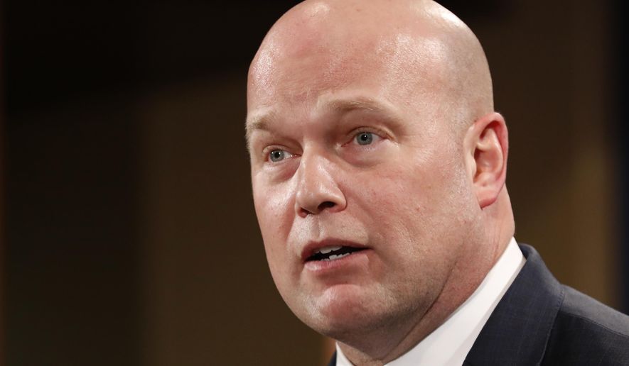 Acting Attorney General Matt Whitaker announces an indictment on violations including bank and wire fraud, Monday, Jan. 28, 2019, of Chines telecommunications companies including Huawei, at the Justice Department in Washington. (AP Photo/Jacquelyn Martin)