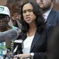In this July 27, 2016, file photo, Baltimore State&#39;s Attorney Marilyn Mosby, right, holds a news conference near the site where Freddie Gray was arrested after her office dropped the remaining charges against three Baltimore police officers awaiting trial in Gray&#39;s death, in Baltimore. Mosby will no longer prosecute any marijuana possession cases, regardless of the quantity of the drug or an individual’s prior criminal record, authorities announced Tuesday, Jan. 29, 2019. (AP Photo/Steve Ruark) ** FILE **