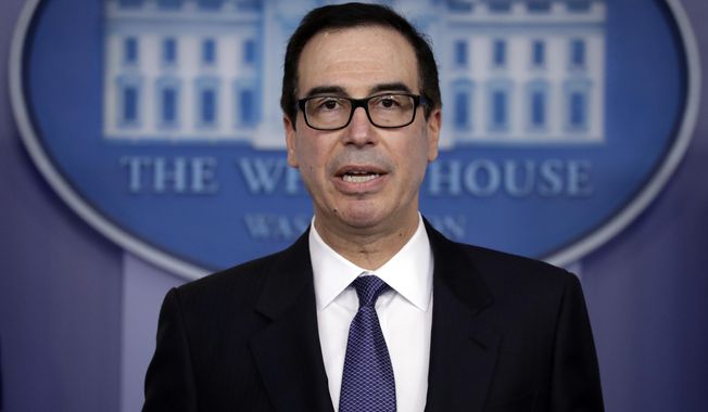 In this Jan. 28, 2019, photo, Treasury Secretary Steven Mnuchin speaks during a press briefing at the White House in Washington. Three senior House Democrats are demanding Mnuchin turn over documents that would show how his department decided to lift financial sanctions against three companies connected to Russian oligarch Oleg Deripaska. (AP Photo/ Evan Vucci)