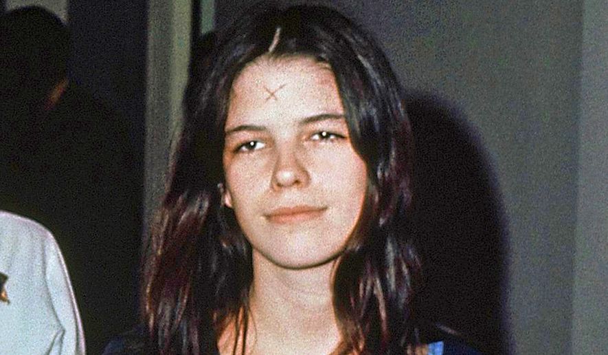 FILE - This March 29, 1971, file photo shows Leslie Van Houten in a Los Angeles lockup. The youngest follower of murderous cult leader Charles Manson will ask a state panel to recommend her for parole. Van Houten, who is now 69, is scheduled for a parole hearing Wednesday, Jan. 30, 2019 at the California Institute for Women. Van Houten was previously recommended for parole twice by a state panel but former California Gov. Jerry Brown blocked her release. (AP Photo, File)
