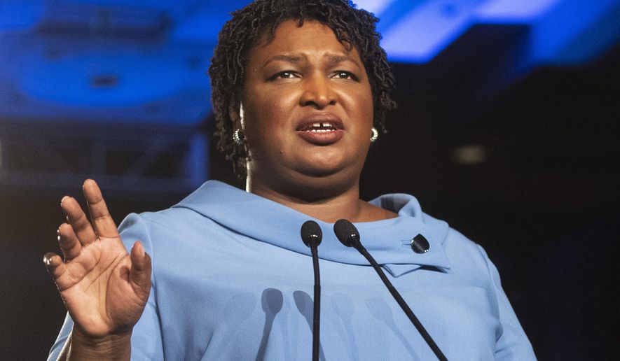 FILE - In this Nov. 6, 2018 file photo, Georgia Democratic gubernatorial candidate Stacey Abrams addresses supporters during an election night watch party in Atlanta. Senate Democratic Leader Charles Schumer says Abrams will deliver the Democratic response to President Donald Trump’s State of the Union address. (AP Photo/John Amis, File)