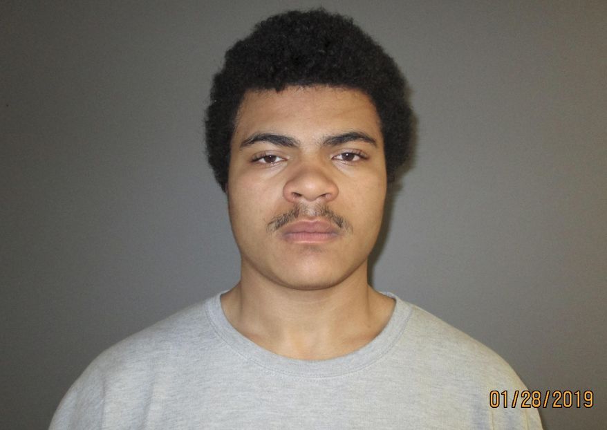 This Monday, Jan. 28, 2019 booking photo provided by Connecticut State Police shows Marcus Fisher, who police have charged with murder in connection with the killings of a man and a woman at a home in southeastern Connecticut. State police on Tuesday identified the suspect as Fisher, who lived at the Montville home where the bodies were found Monday. (Connecticut State Police via AP)