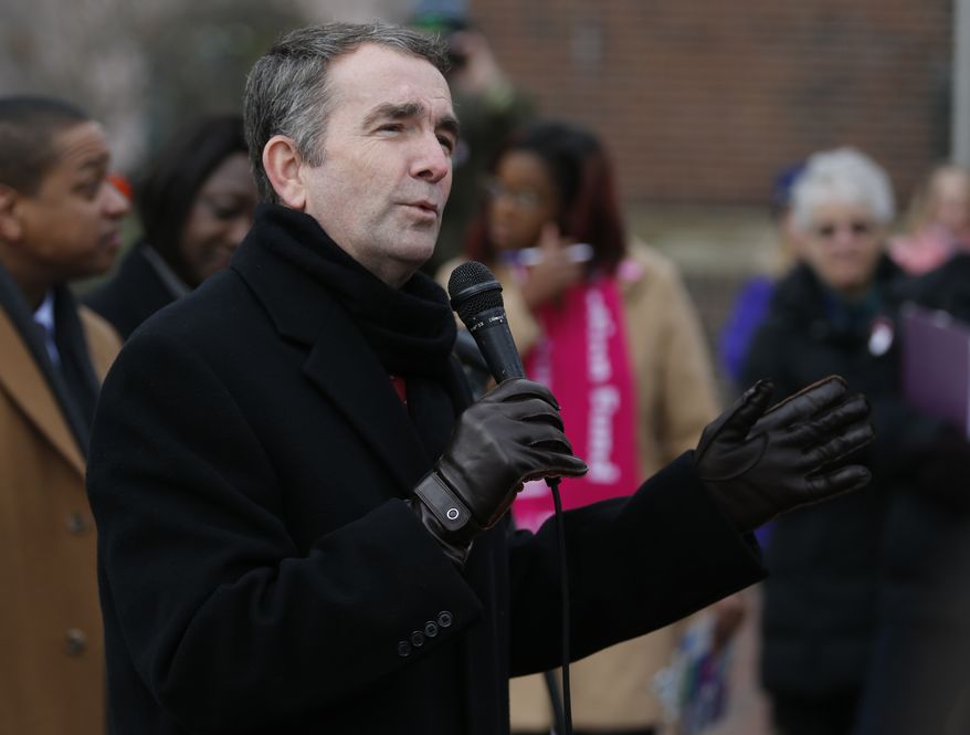 In this Jan. 14, 2019, file photo, Virginia Gov. Ralph Northam speaks to a crowd during a Women&#x27;s Rights rally at the Capitol in Richmond, Va. A push by Virginia Democrats to loosen restrictions on late-term abortions is erupting into a fierce partisan clash due to a lawmaker&#x27;s comments about late-term abortion. Gov. Ralph Northam added gas to the fire Wednesday, Jan. 30, by describing a hypothetical situation where an infant who is severely deformed or unable to survive after birth could be left to die. (AP Photo/Steve Helber, File) **FILE**