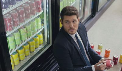 Pepsi has long enlisted musicians to help sell its drinks and snacks. Michael Bubl will star in a Super Bowl ad on Sunday for Pepsi&#39;s Bubly sparkling water brand. (Associated Press)