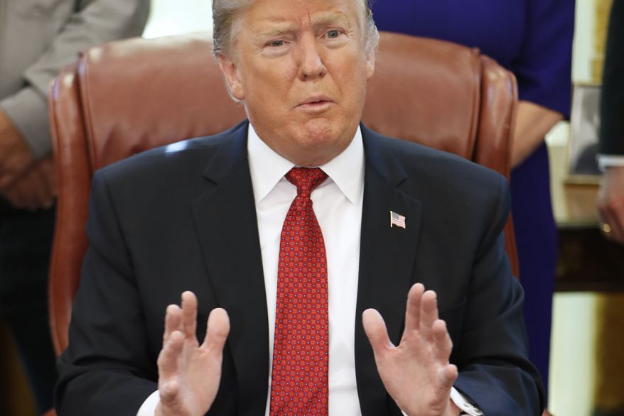 President Donald Trump speaks during a meeting with American manufacturers in the Oval Office of the White House, Thursday, Jan. 31, 2019, in Washington. Trump was signing an executive order pushing those who receive federal funds to "buy American." (AP Photo/Jacquelyn Martin)