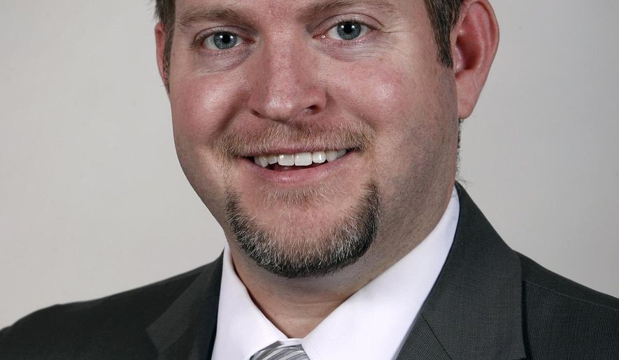 FILE - In this Feb. 8, 2017, file photo State Sen. Jake Chapman, R-Adel, poses at the Statehouse in Des Moines, Iowa. A majority of legislators in the Iowa Senate, frustrated at repeated court rulings declaring anti-abortion laws unconstitutional, have introduced a proposed amendment to the Iowa Constitution that would declare it "does not secure or protect a right to abortion." The proposed amendment was introduced Jan. 24, 2019, by Chapman two days after a state court judge struck down yet another attempt by the Legislature to limit abortion. (AP Photo/Charlie Neibergall, File)