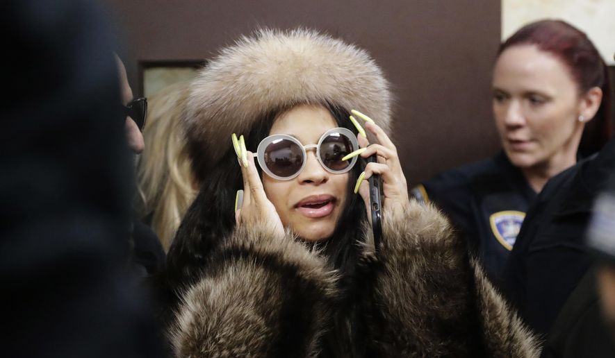 Cardi B leaves Queens County Criminal Court, Thursday, Jan. 31, 2019, in New York. The rapper made an appearance in connection with a melee she was involved in at a New York strip club. (AP Photo/Frank Franklin II)