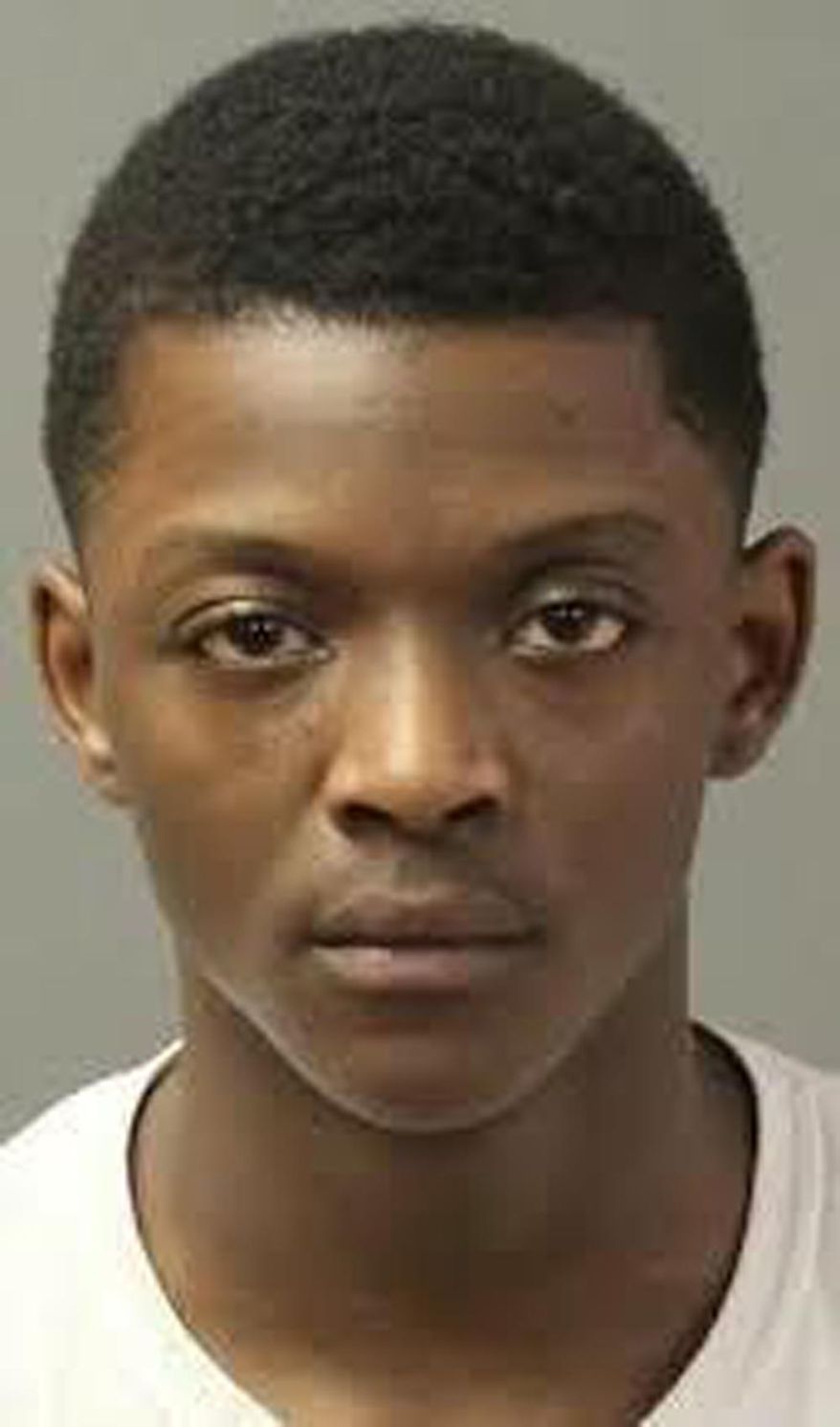 This undated booking photo from Douglas County (Neb.) Corrections Department shows Tyon Wells. A judge has sentenced the 15-year-old boy to 22 to 48 years in prison in the fatal shooting of an Omaha teenager during a dispute that prosecutors say involved drugs. Wells was sentenced Wednesday, Jan. 30, 2019, after pleading no contest in November to second-degree murder in the death of 17-year-old Zachary Parker. (Douglas County Corrections Department via AP)