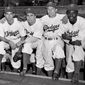 FILE - In this April 15, 1947, file photo, from left, Brooklyn Dodgers baseball players John Jorgensen, Pee Wee Reese, Ed Stanky and Jackie Robinson pose at Ebbets Field in New York. Thursday, Jan. 31, 2017, marked the 100th anniversary of the birth of Jackie Robinson, who broke Major League Baseball’s color barrier, on April 15, 1947. AP Photo, File)