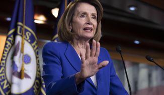 Speaker of the House Nancy Pelosi, D-Calif., talks to reporters during a news conference a day after a bipartisan group of House and Senate bargainers met to craft a border security compromise aimed at avoiding another government shutdown, at the Capitol in Washington, Thursday, Jan. 31, 2019. (AP Photo/J. Scott Applewhite)