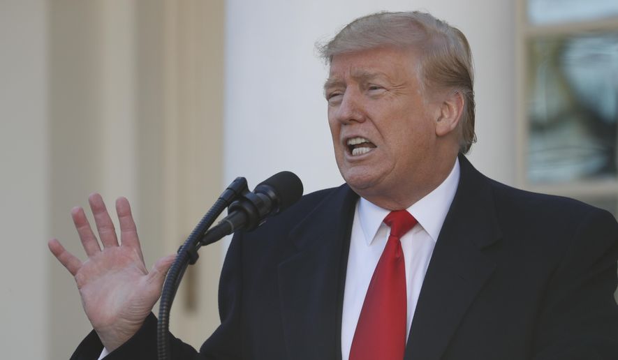 In this Jan. 25, 2019, photo, President Donald Trump speaks in the Rose Garden of the White House in Washington. While government reopens, Trump remains behind closed doors. (AP Photo/Jacquelyn Martin) ** FILE **