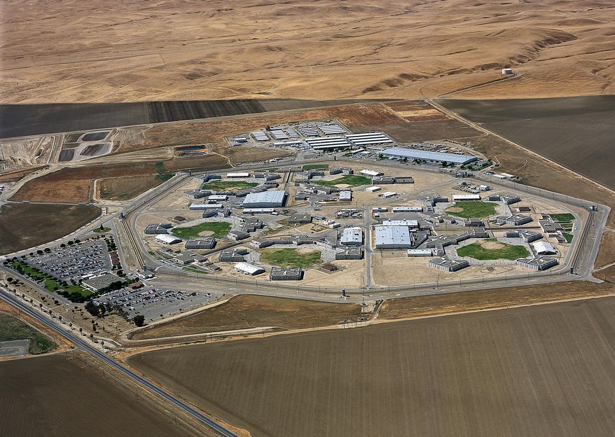 FILE - This undated file photo released by the Avenal State Prison public information office shows an aerial view of Avenal State Prison in Avenal in California's Central Valley. A U.S. appeals court has thrown out lawsuits by California prison inmates, including those at Avenal and elsewhere, accusing state officials of failing to protect them against an airborne fungus that was more prevalent in prisons. A three-judge panel of the 9th U.S. Circuit Court of Appeals ruled Friday, Feb. 1, 2019, that state prison officials could not be sued over Valley Fever because they were acting under the guidance of a federal monitor. (Avenal State Prison Public Information Office via AP)