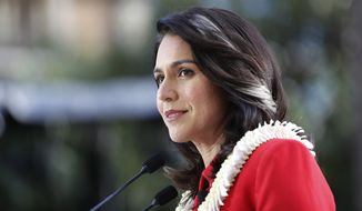 U.S. Rep. Tulsi Gabbard, D-Hawaii, speaks during a campaign rally announcing her candidacy for president in Waikiki, Saturday, Feb. 2, 2019, in Honolulu. (AP Photo/Marco Garcia) ** FILE **