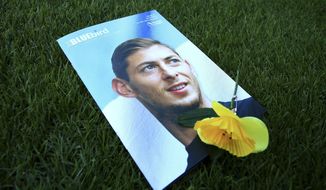 A view of the match day programme with an image of Emiliano Sala on the cover, ahead of the English Premier League soccer match between Cardiff and Bournemouth at the Cardiff City Stadium, in Cardiff, Wales, Saturday, Feb. 2, 2019. (Mark Kerton/PA via AP)