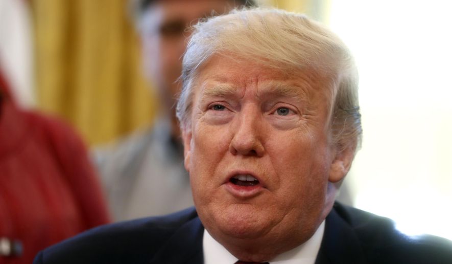 In this Jan. 31, 2019, photo, President Donald Trump speaks during a meeting with American manufacturers in the Oval Office of the White House in Washington. (AP Photo/Jacquelyn Martin)