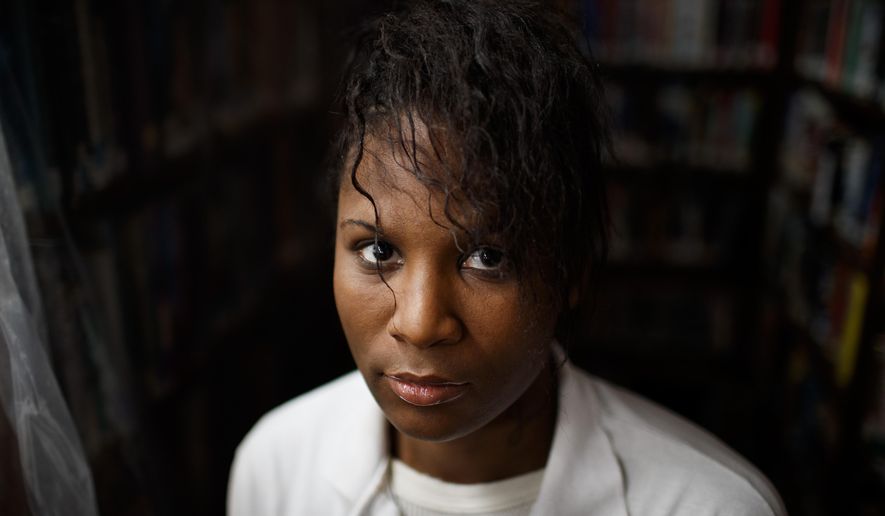 Strawberry Hampton, 27, poses for a portrait at the Logan Correctional Center Jan. 17, 2019, in Lincoln, Ill. Just before Christmas, the 27-year-old transgender inmate was granted a rare transfer to a women’s prison in alignment with her gender identity. The move came amid her yearlong court battle chronicling allegations of abuse and sexual assault by both inmates and corrections staff at four men’s facilities across Illinois. (Armando L. Sanchez/Chicago Tribune via AP)
