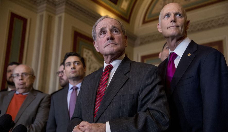 In this Jan. 30, 2019, photo, from left, OAS Special Representative Gustavo Tarre Briceno, Venezuelan opposition&#39;s new envoy in Washington Carlos Vecchio, Chairman Sen. James Risch, R-Idaho, and Sen. Rick Scott, R-Fla., listen to a question from a reporter at a news conference following a Senate Foreign Relations Committee meeting on Capitol Hill in Washington. Two years into President Donald Trump’s administration, the president’s allies in Congress are quietly trying to influence and even reshape his “America First” foreign policy agenda. (AP Photo/Andrew Harnik)