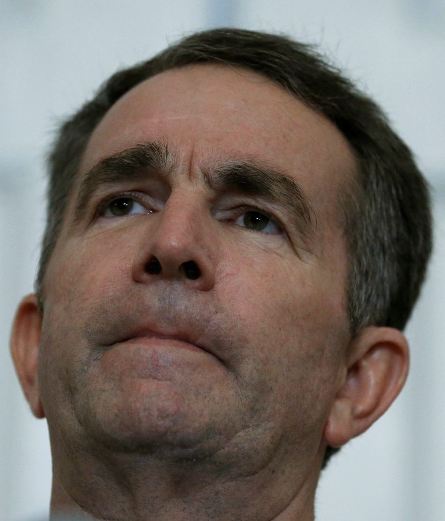 holding on: Virginia Gov. Ralph Northam is vowing to remain in office, but fellow Democrats say he needs to step down amid furor over a racist photo. (Associated Press)