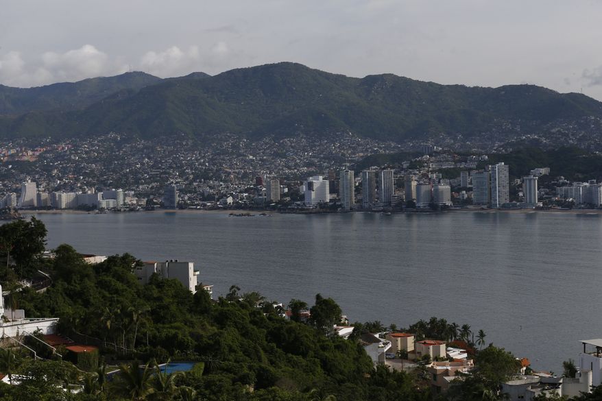 This June 20, 2018 photo, shows a view of Acapulco, Mexico. Last year, authorities opened investigations into 834 murders in Acapulco. Acapulco is in the same state where 43 students from a teacher&#x27;s college disappeared in 2014 in a still unsolved case that implicates local officials, police and possibly the military.(AP Photo / Marco Ugarte)